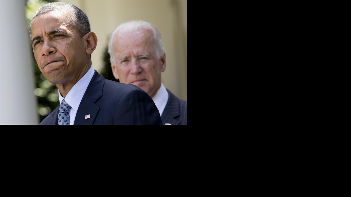
President Obama, accompanied by Vice President Joe Biden, pauses while making an announcement about immigration reform in the Rose Garden of the White House in Washington in June.
