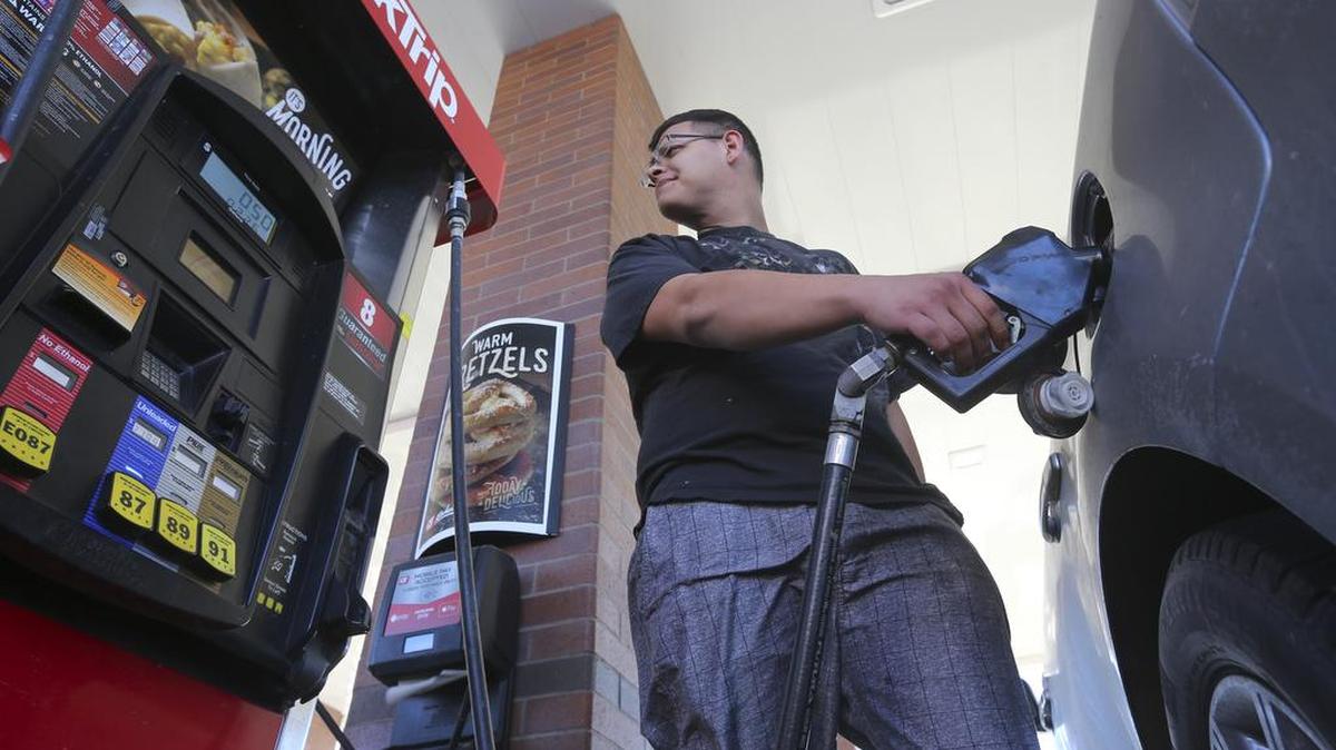Gas prices have slowly been rising across the nation. Daniel McHenry of Salina fills his truck at a QuikTrip in Park City recently.