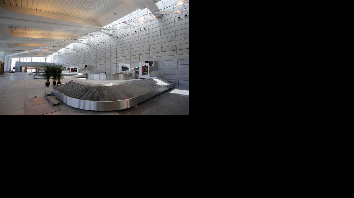 
Three baggage carousels make up the south section of Wichita's new Dwight D. Eisenhower National Airport. (April 9, 2015) 
