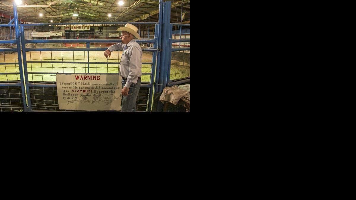 
Bud Sankey looks over his indoor area that was last used five years ago. Sankey was the 1972 National Cutting Horse Champion and has won over 150 championship trophies and raises Professional Rodeo Championship Association bucking bulls and founded the Sankey Rodeo School. 
