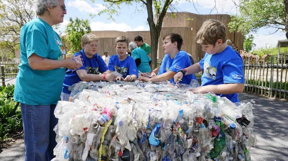 Students from St. Mark’s School take part in an environmental fair at Sedgwick County Zoo to celebrate Earth Day on April 21, 2016.
