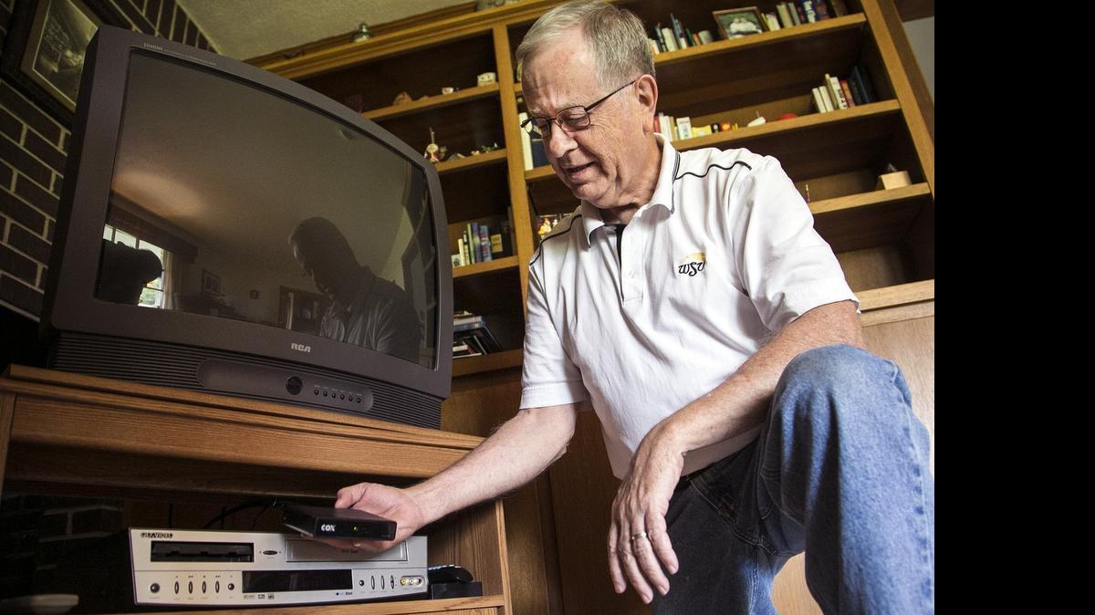 
Larry Frutiger installed a Cox-supplied digital converter enabling him to get cable programing on his analog television. He is buying a new TV because the picture no longer displays properly. (May 22, 2015)
