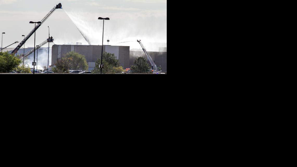 
Firefighters at Mid Continent Airport Thursday morning where a King Air plane reportedly crashed into the FlightSafety Building. (Oct. 30, 2014) 
