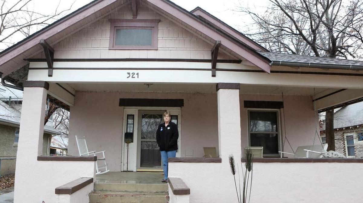 Lori Lawrence says the foundation of her 1917 home was damaged by the recent earthquakes. Lawrence has become one of the leading organizers for the Kansas chapter of the Sierra Club trying to document local damage from earthquakes.