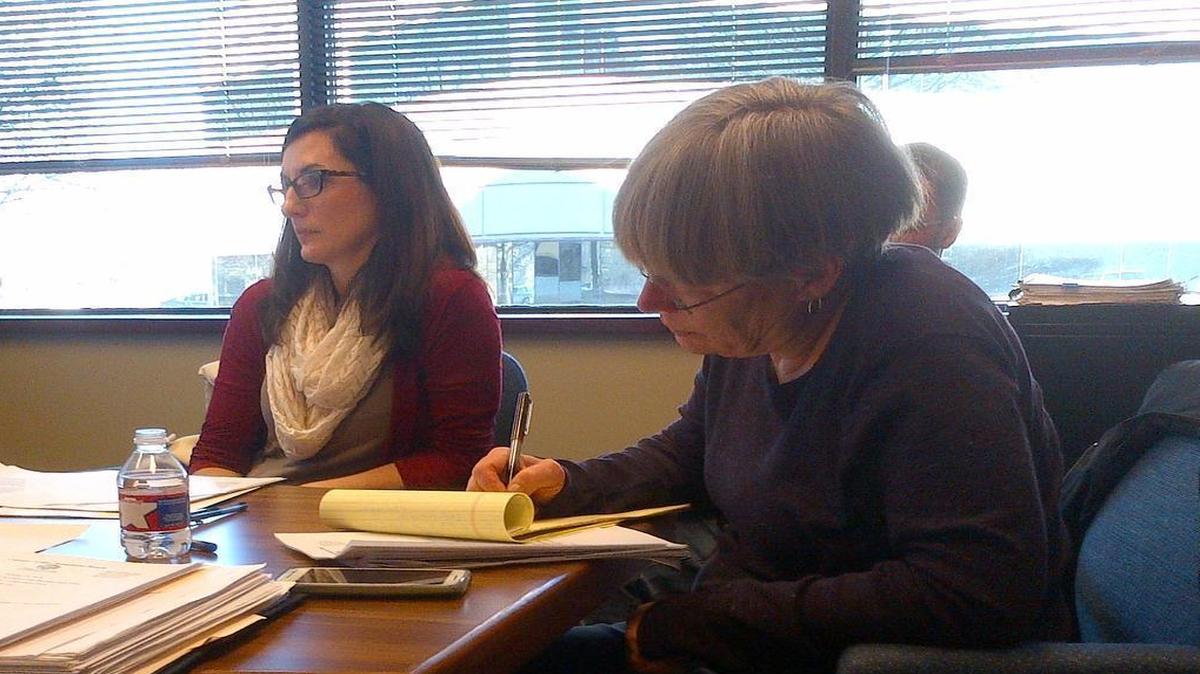 CURB chairwoman Ellen Janoski, left, and former consumer counsel Niki Christopher attend a board meeting on Jan. 6.