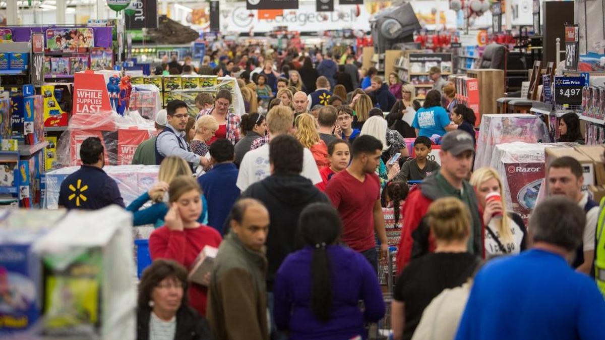 Customers shop at Wal-Mart’s Black Friday shopping event in Rogers, Ark.