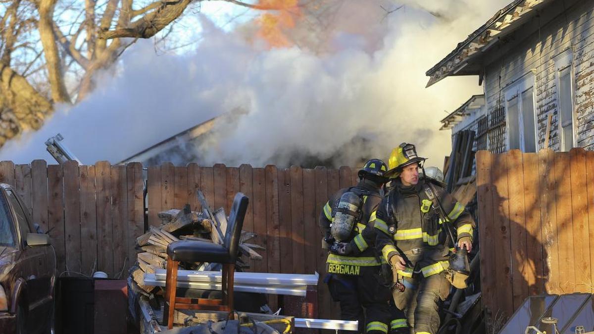 Wichita firefighters work a large fire in a detached garage on South Elizabeth on Wednesday morning. (Feb. 10, 2016)