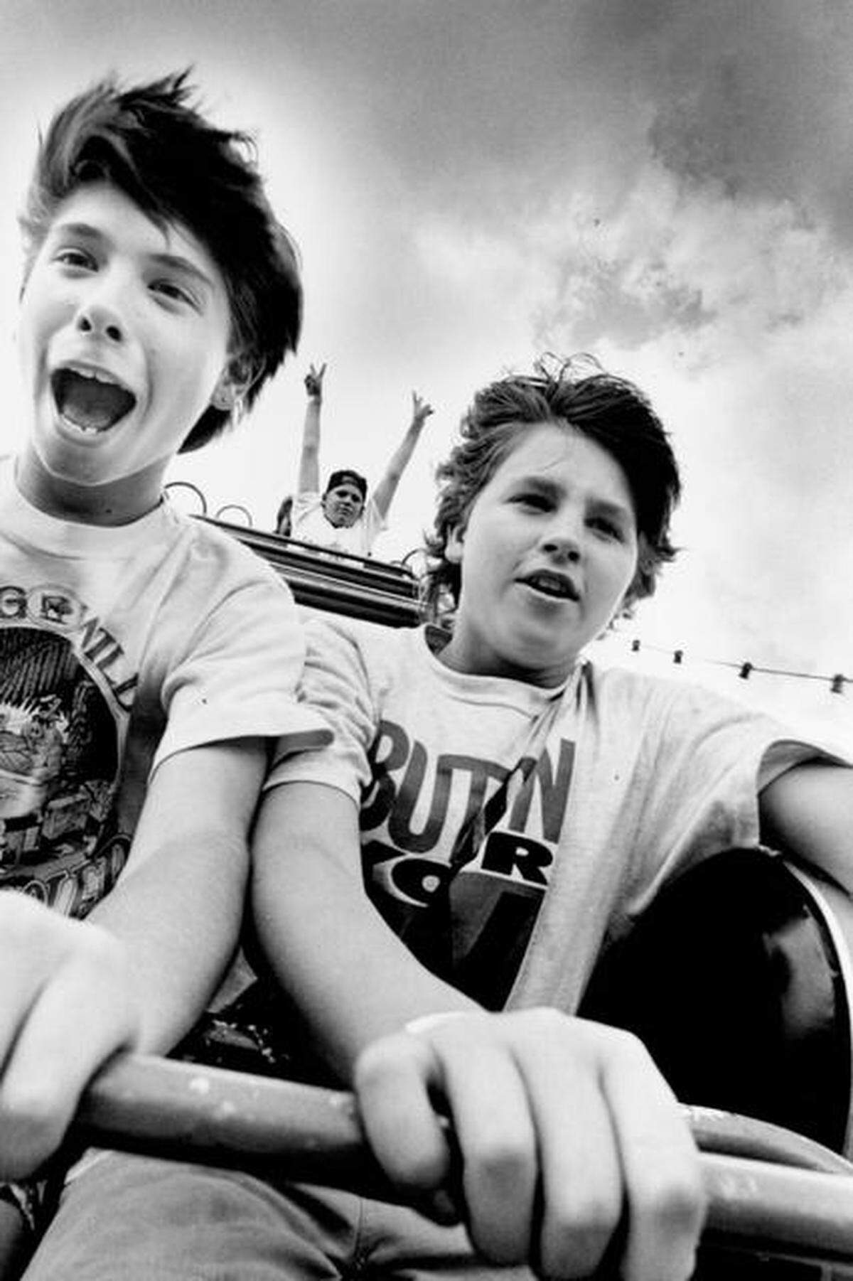 Eugene Sawyer and Emory Fowler enjoy the roller coaster at Joyland in 1992.