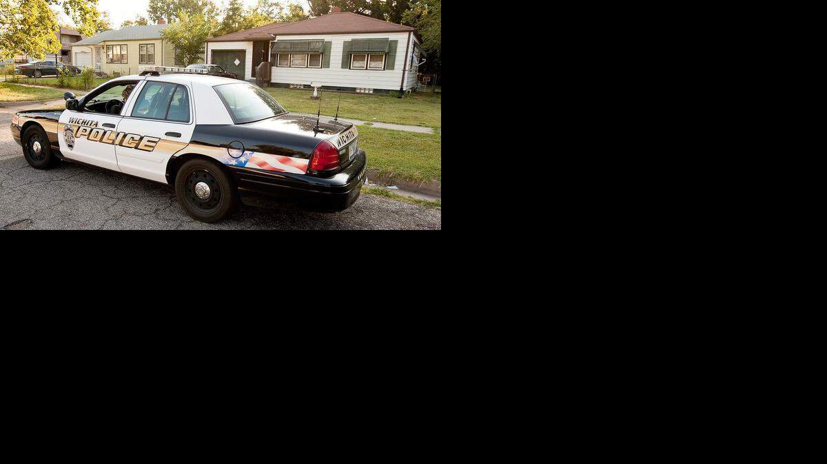 
Wichita police investigate the scene at 708 N. Spruce where 43-year-old Karen Jackson was shot by police officers. 
