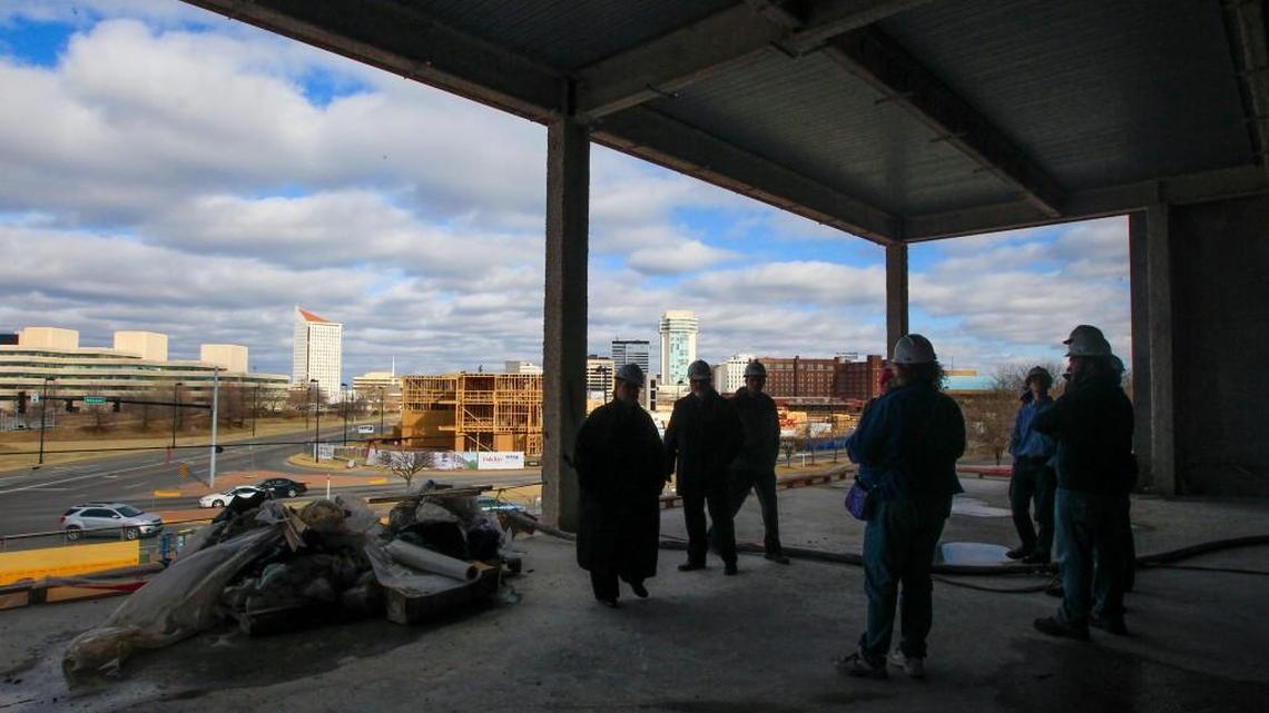 Cynthia Berner, director of libraries for the city of Wichita, leads a tour Friday of the new Advanced Learning Library. Here she shows a reading area that will have huge windows and a great view for patrons. The new library is near the corner of McLean and Second Street and is slated to open in February 2018.