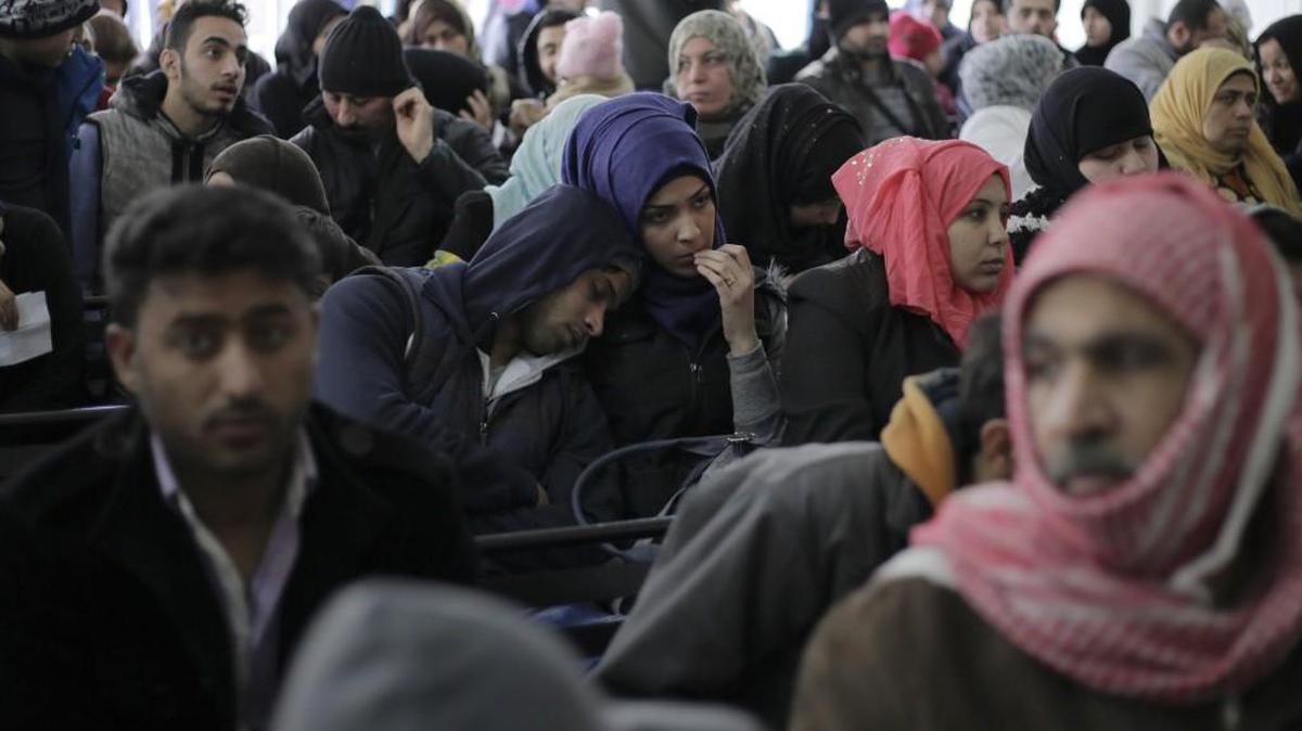 Hundred of Syrian families wait to register at the United Nations High Commissioner for Refugees (UNHCR) headquarters, in Beirut, Lebanon, Monday, Jan. 30, 2017. By executive order, U.S. President Donald Trump issued a 90-day order Friday that affects travel to the U.S. by citizens of Iraq, Syria, Iran, Sudan, Libya, Somalia and Yemen and puts an indefinite hold on a program resettling Syrian refugees.