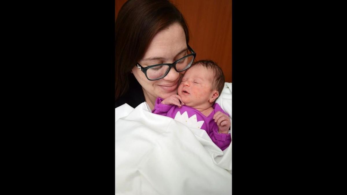 Amanda Wilson with her first child, Letty Wynona. When they left St. Joseph to return home Thursday, Wilson discovered her car had been stolen from the parking lot.