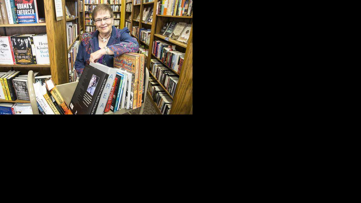 
Sharon Pedroja volunteers for a variety of organizations, but one of her favorites is to help out at Watermark Books. (Sept. 26, 2014) 
