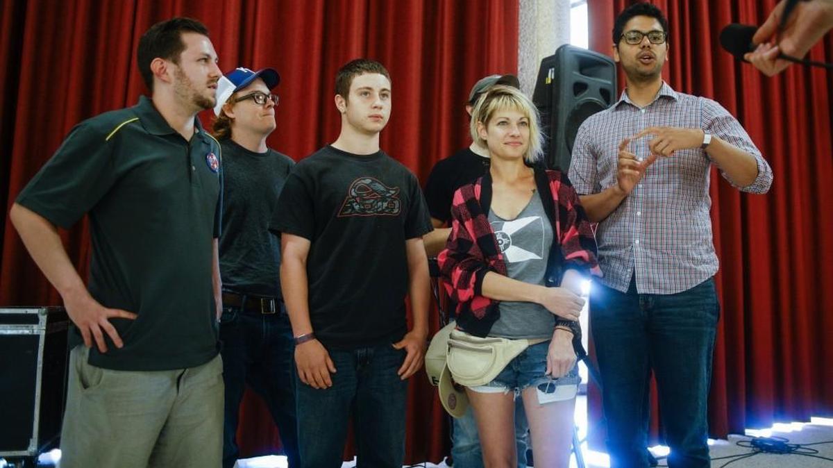 Nicholas Gallo, member of the group called Pac Wichita, gives interviews after winning Hackathon on Sunday afternoon during the Hackathon presentation in Century II. (June 5, 2016)