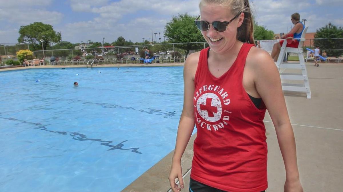 Evan Black,17, lifeguards at Rockwood Pool in east Wichita. She also is an assistant manager, swim coach and swim instructor there. This is her third summer working at the pool.