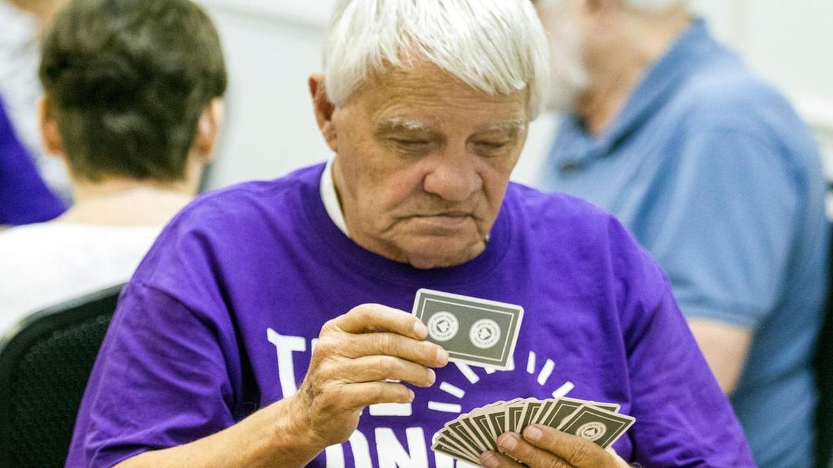 
Pat Anderson sorts his hand Monday during the Longest Day bridge fundraiser hosted by the Wichita Duplicate Bridge Center in the lower level of Parklane Shopping Center. Continuous games were played from 6:30 a.m. to 10:30 p.m. to raise money for the Alzheimer Association. (June 22, 2015)
