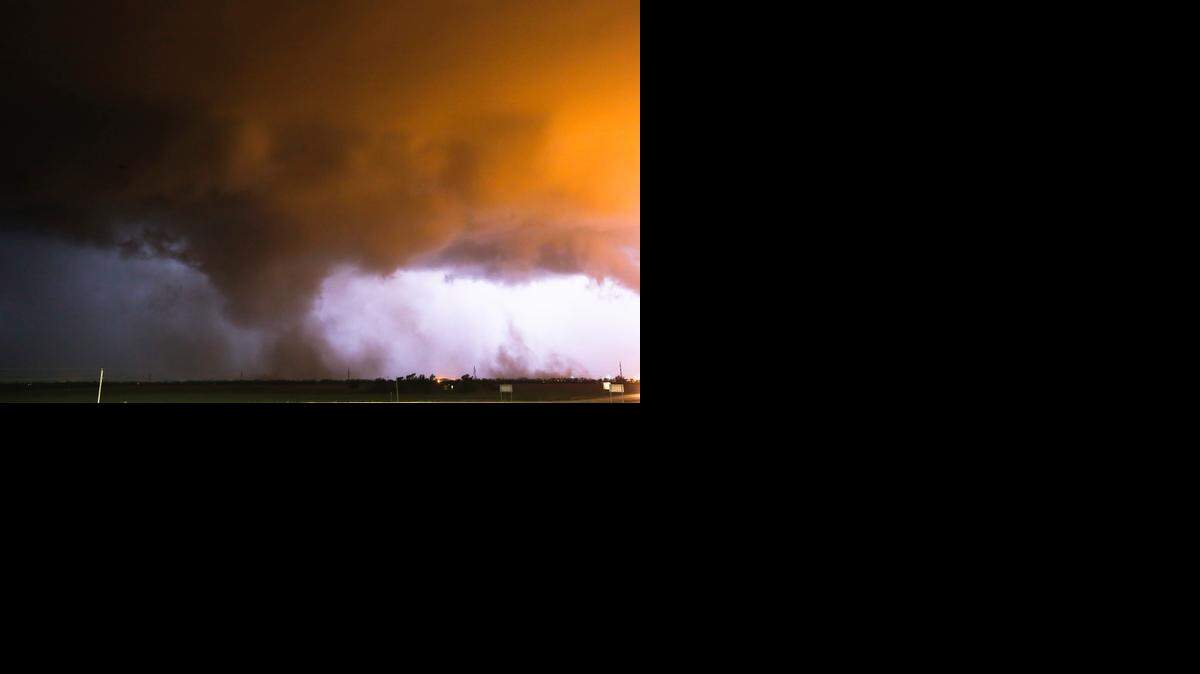 
A tornado can be seen forming just south of McPherson.
