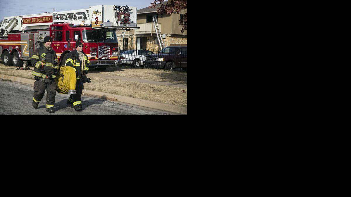 
Wichita firefighters pack up after an apartment fire at 1000 S. Woodlawn on Wednesday morning. (Nov. 12, 2014)
