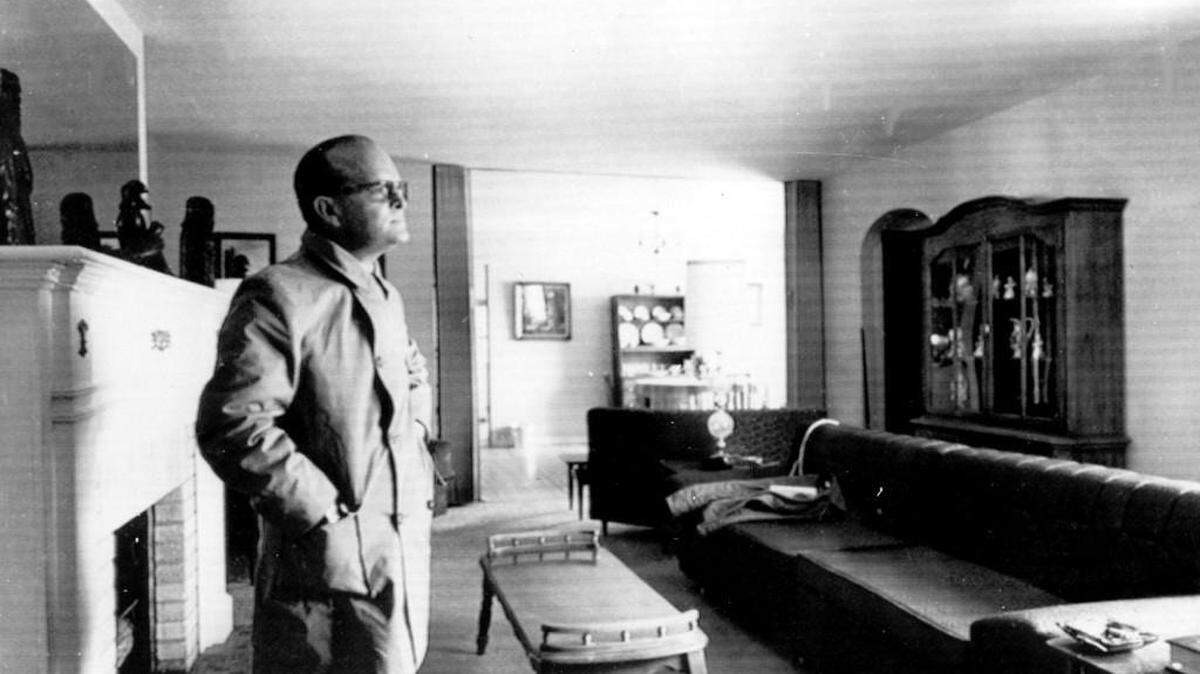 Author Truman Capote stands in the living room of the Clutter ranch house in 1967 where four members of the Kansas family were murdered in 1959. Capote’s account of the crime, “In Cold Blood,” was a best-seller. Capote declared his “nonfiction novel” was an advance in literature.
