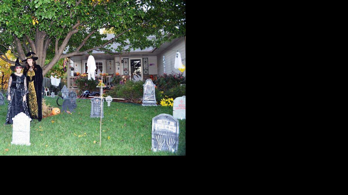 
Jane Barton and her daughter, Kyla Wulf, dressed up for the Barton family Halloween display.
