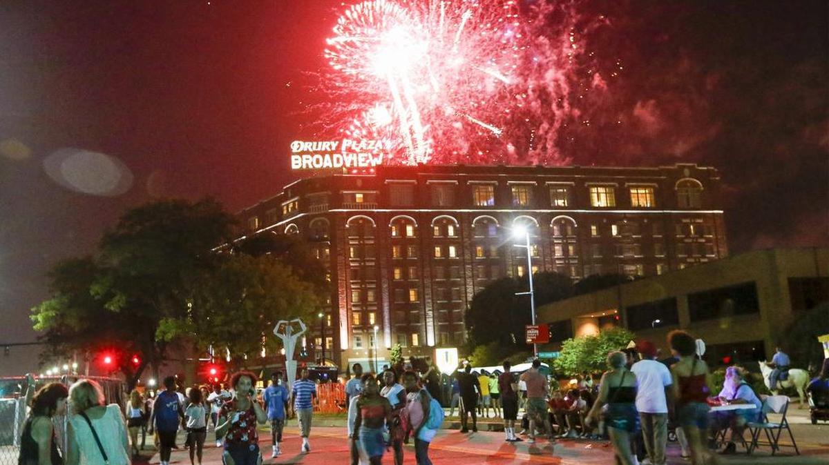 Spectators watch the fireworks as the 2015 Riverfest comes to an end. (June 6, 2015)
