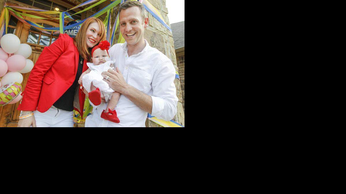 
Ryan and Brynne Mulloy are overwhelmed with emotion after finally having their baby Eevie back at home. She spent her first six months in a Kansas City hospital where she has been been battling congenital leukemia. (May 15, 2014)
