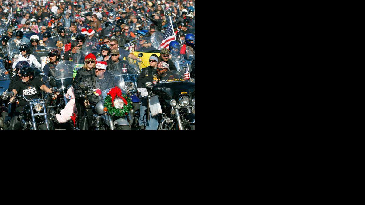 
In 2011, nearly 3,000 motorcyclists left from Lawrence-Dumont Stadium and rode together to the Kansas Coliseum with toys strapped to their bikes in the Wichita Toy Run. (Nov. 6, 2011)
