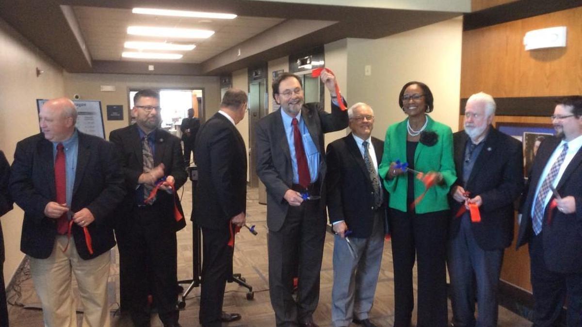 Wichita City Council members and Sedgwick County Commissioners at a ribbon-cutting ceremony for the opening of the Ronald Reagan Building on Tuesday.