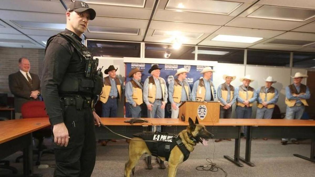 Wichita police Officer Daniel Gumm works with police dog Rooster in March 2015. Rooster was shot and killed on March 18, 2017, during a standoff.
