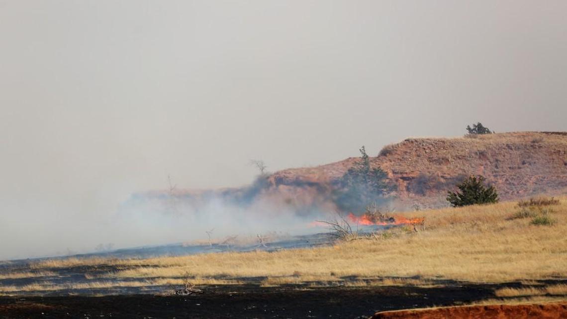 Fire burns on a side hill south of Lake City on Wednesday, March 23, 2016.