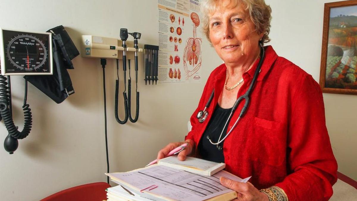 Donna Sweet, professor and clinician, stands in one of the exam rooms at The University of Kansas School of Medicine-Wichita
