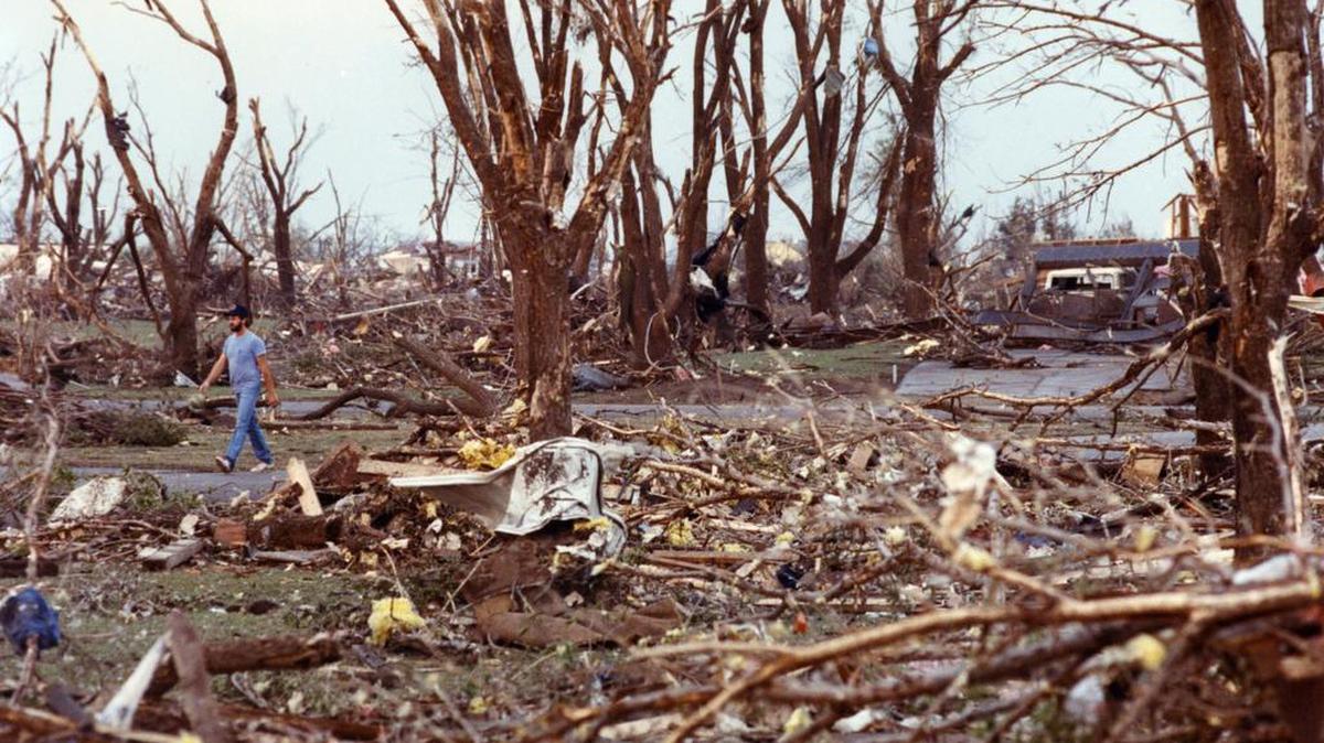 A southeast Wichita neighborhood was left with shredded trees and flattened homes after a tornado passed through on April 26, 1991.