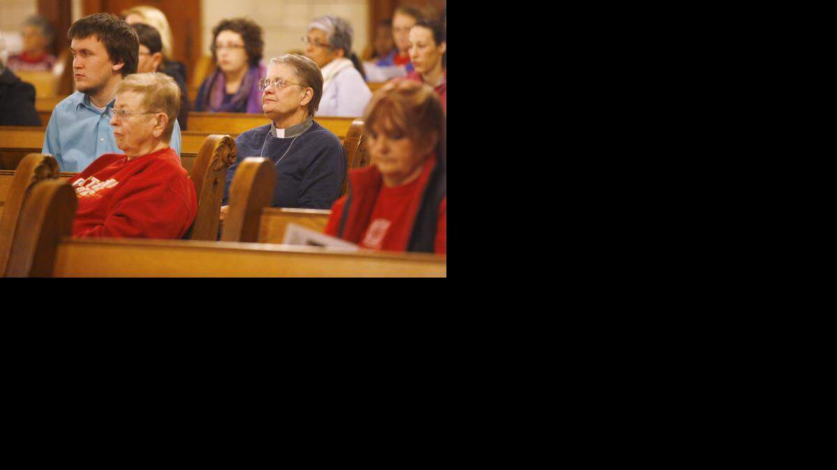 
Advocates to End Chronic Homelessness sponsored a Homeless Persons Memorial Day Service on Sunday night at St. John’s Episcopal Church for those who died in 2014. (Dec. 21, 2014)
