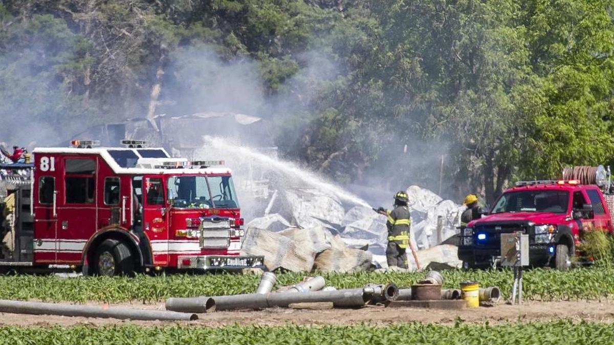 Multiple agencies battle a barn fire on South Hillside, southwest of Derby. (May 12, 2016)