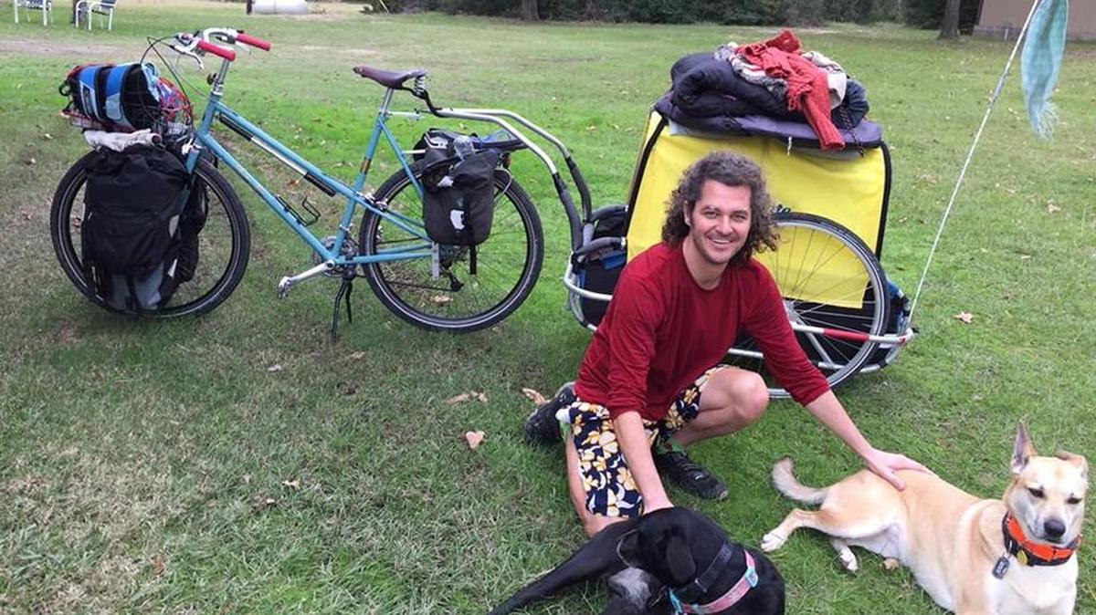 Steven James Lewis with his two dogs, Abby, left, and Darby, right. Lewis and Darby were killed in a June 3 bicycle-pickup truck crash near Derby.