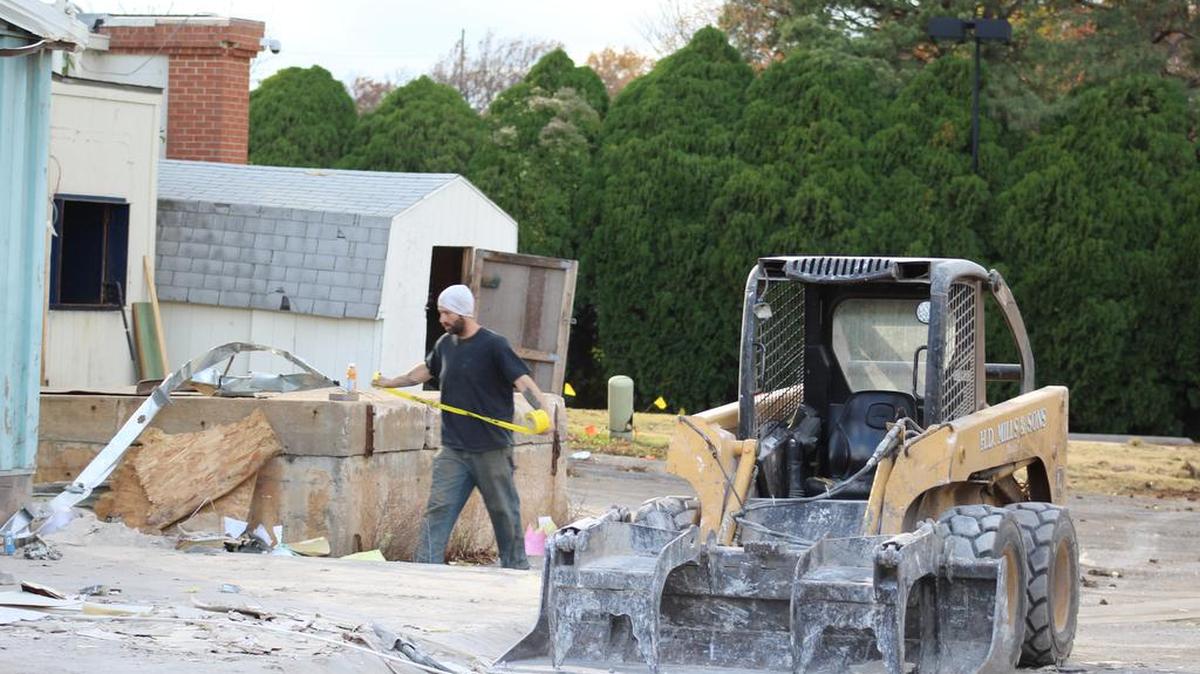 A man was critically injured Friday afternoon when a skid-steer loader tipped over on him at the old Piccadilly Square near Central and Rock Road.