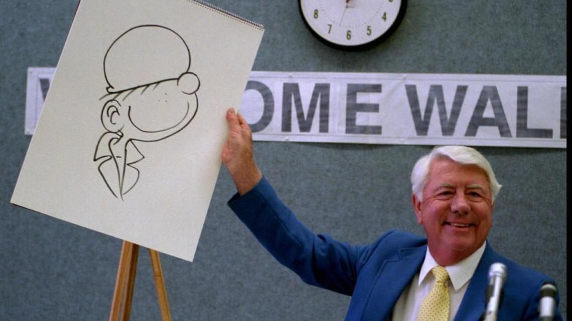 Cartoonist Mort Walker talks about his most famous character Beetle Bailey at a luncheon honoring him in El Dorado in 1994. Walker, who was born in El Dorado, died Saturday at the age of 94.