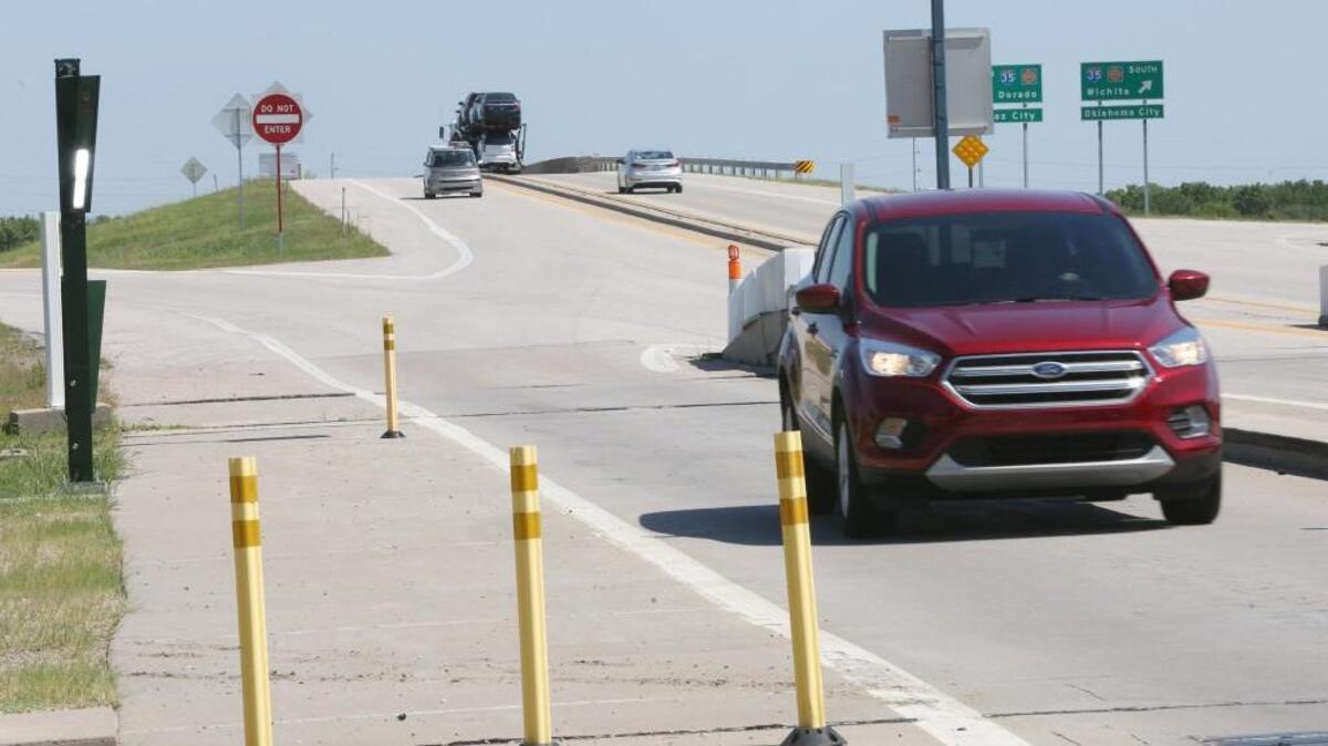 A camera on the exit from the Kansas Turnpike to K-96 snaps a photo of a car entering the K-Tag lane.