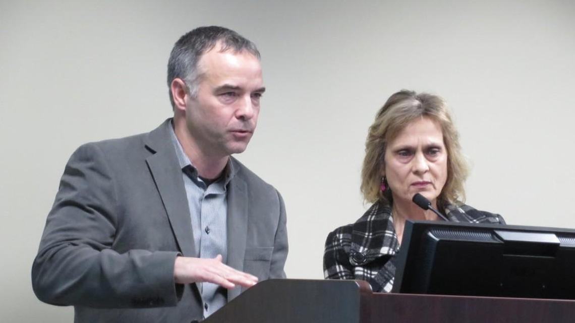 Greg Tice, representing Central Community Church, answers questions about building heights from neighbor Teresa Miller.