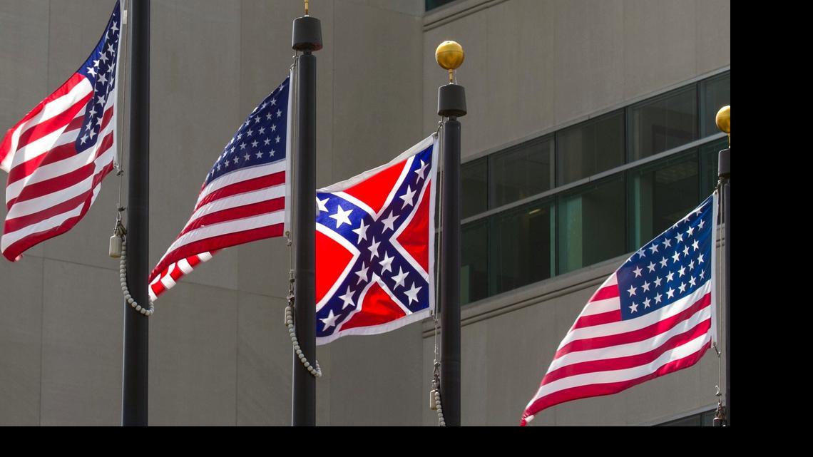 
The flag of the Confederate States of America flies with other flags at the John S. Stevens Pavilion at Veterans Memorial Plaza in Wichita. (June 23, 2015) 
