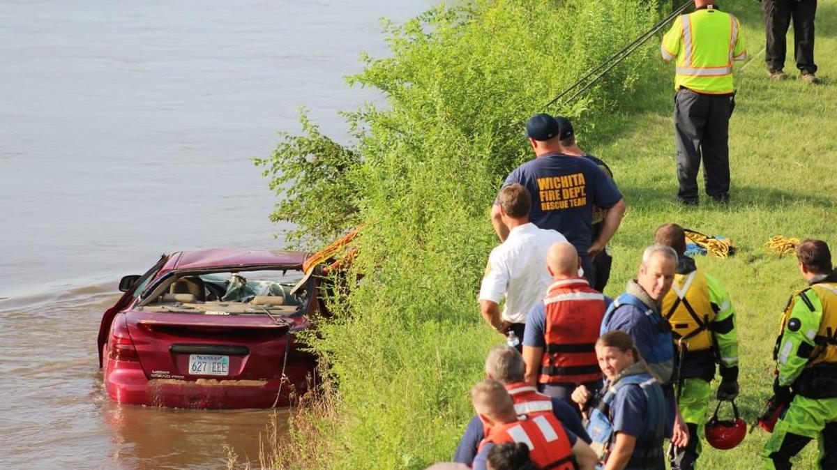 The submerged car pulled from the Arkansas River on Wednesday evening had been reported stolen, police say. (July 13, 2016)