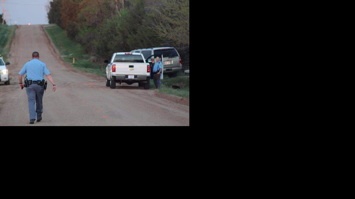 
Deputies with the Sedgwick County Sheriff’s Office investigate a vehicle-pedestrian collision southwest of Andale Tuesday evening.
