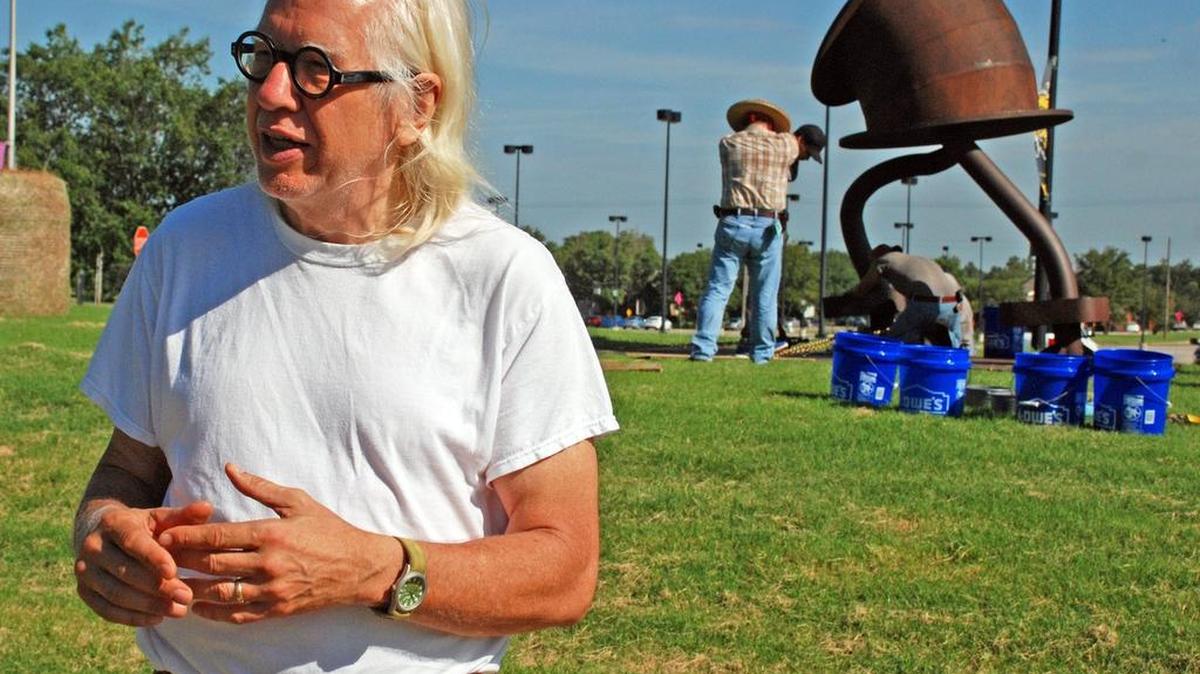 
Tom Otterness talks about his sculpture "Makin' Hay" on Saturday morning at Wichita State University.

