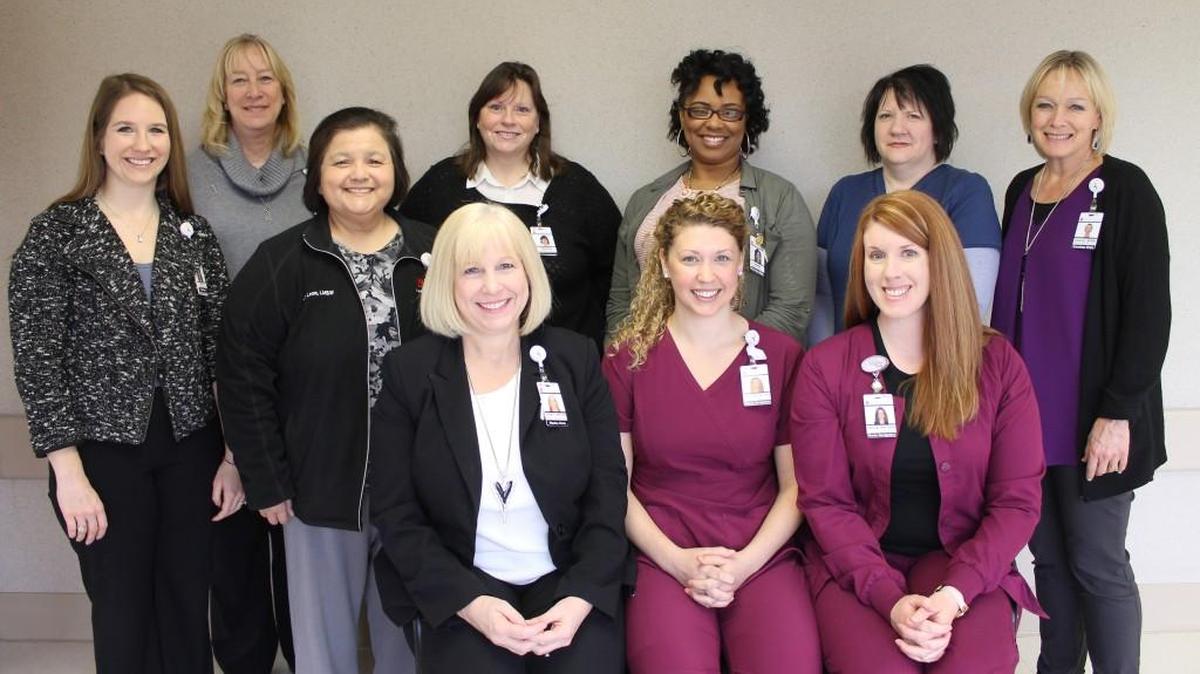 Members of Wesley Medical Center’s cancer program pose for a photo. The program just earned accreditation from the Commission on Cancer.