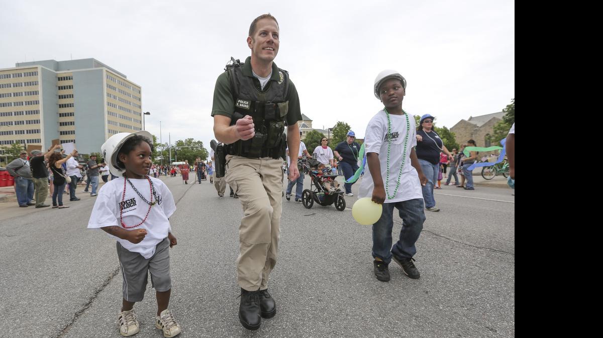 
Wichita police Officer Tim Baird show off his dance moves Saturday during the Support Local Law Enforcement Community Parade in downtown Wichita.
