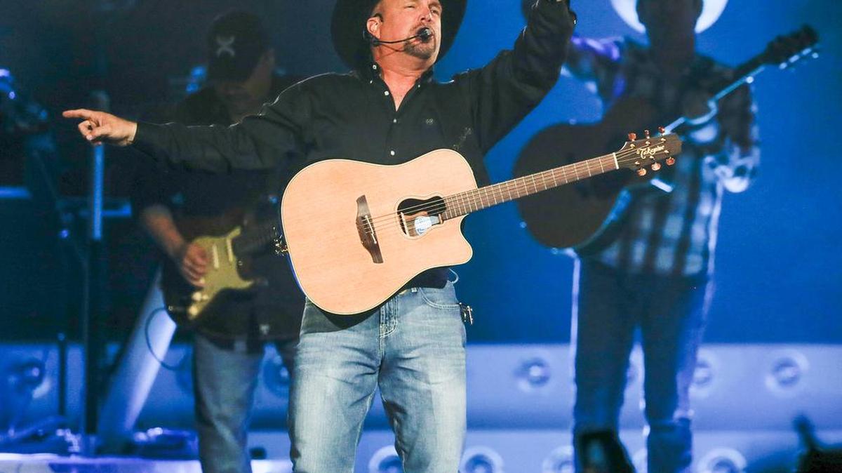 Garth Brooks entertains the crowd at the Intrust Bank Arena Thursday. (Dec. 3, 2015)