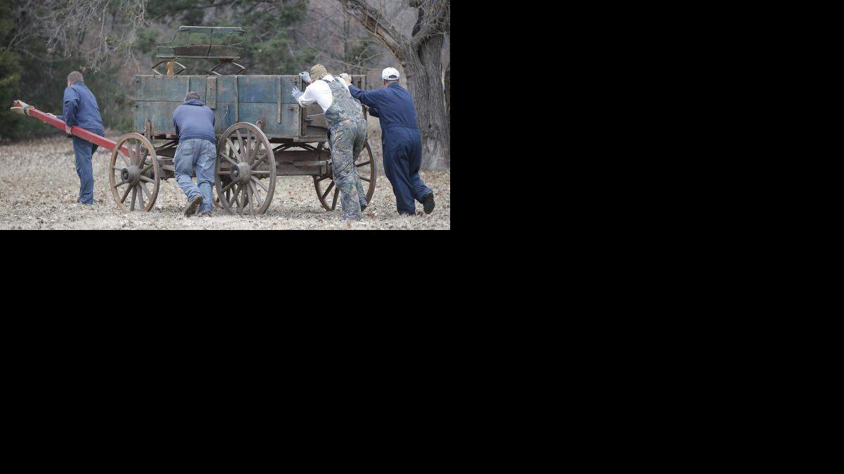 
A wagon is pushed to its permanent place at the new Memories Park at Sedgwick County Park on Thursday. Memories Park will have its grand opening this Saturday.
