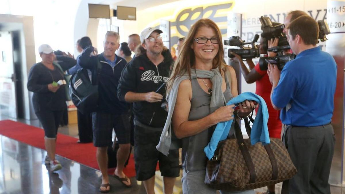 Passengers arriving on the first flight into Wichita Eisenhower National Airport’s new terminal were greeted by an excited crowd armed with noisemakers. The passengers were given gifts to commemorate the historic flight. (June 3, 2015)