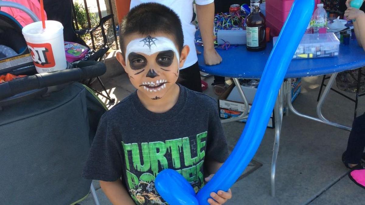 Having his face painted was 6-year-old Elijah Gonzales’ favorite part of Dia de los Muertos, or the Day of the Dead, on Saturday in north Wichita.