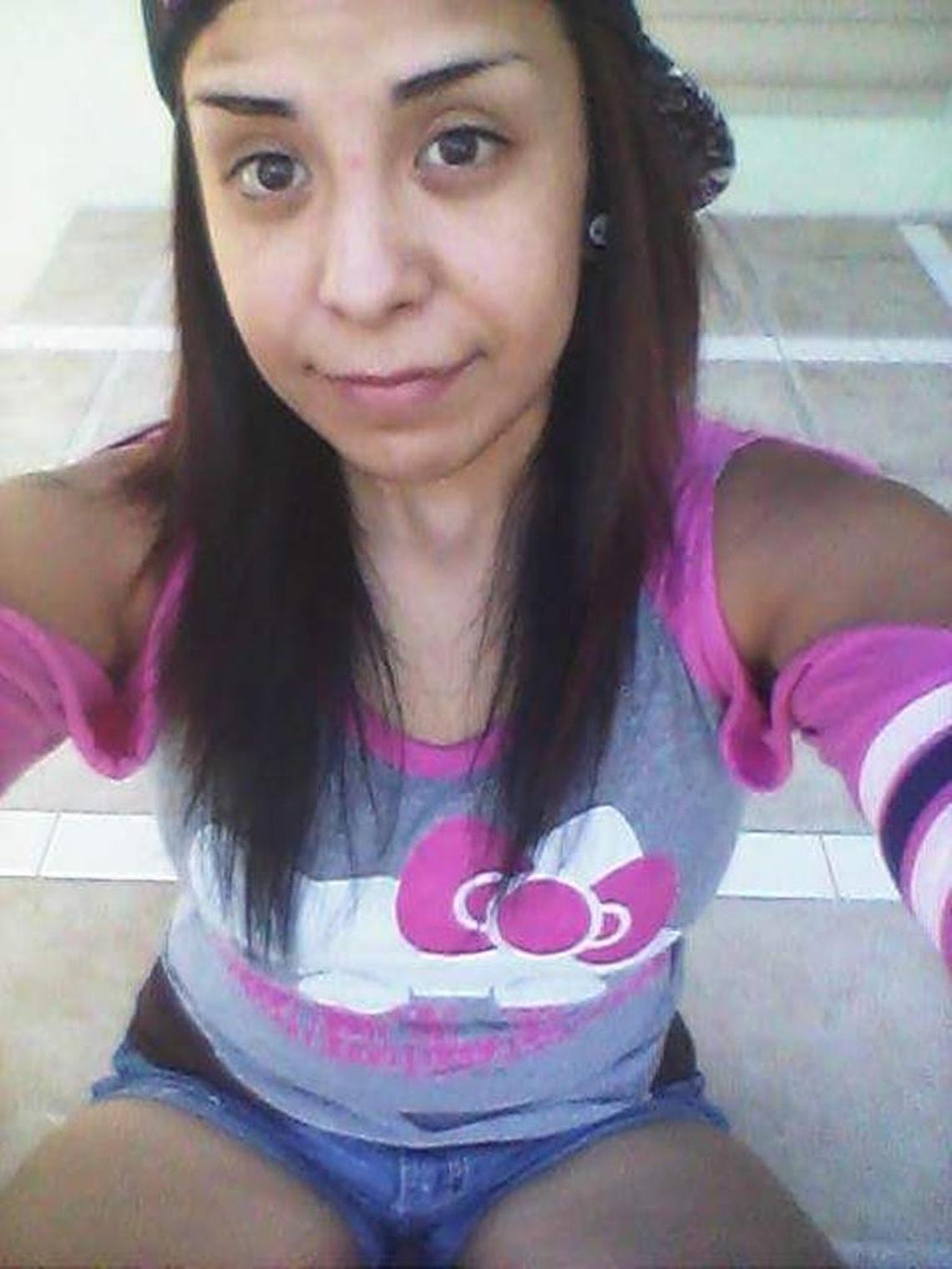 Sandra Flores, 26, was found dead in a strip mall parking lot at Pawnee and Seneca on March 17. Police think she was hit once by a high-powered rifle “from some distance away” while she was taking a morning walk.